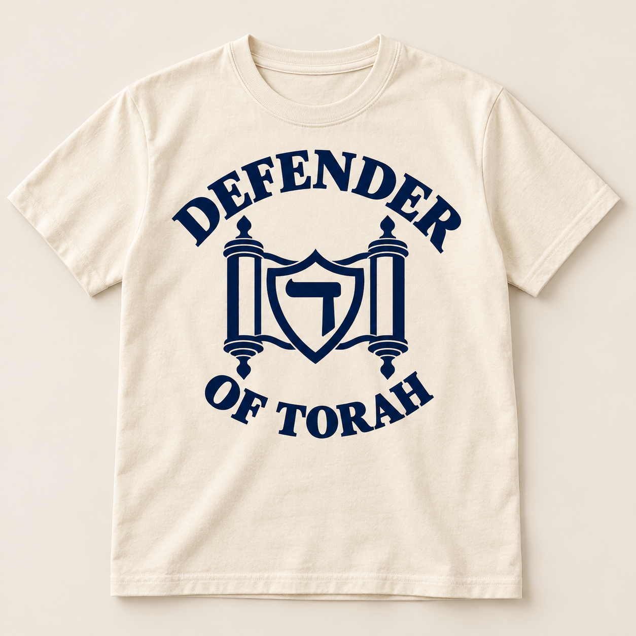 The Signature Tee in cream / navy, with the Defender of Torah logo